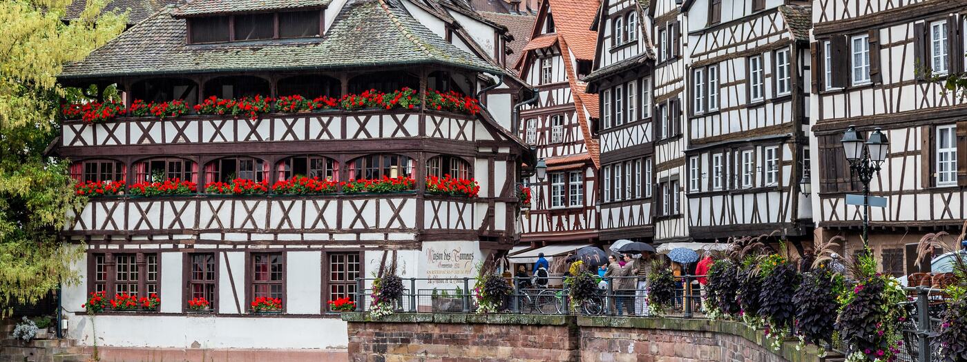 The Maison des Tanneurs in La Petite France, its balconies covered in red geraniums